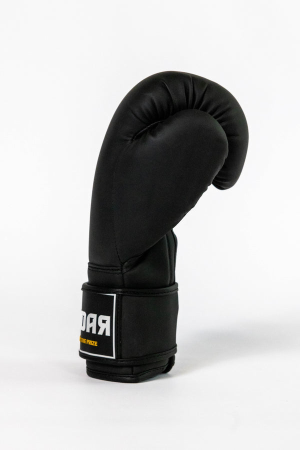 Radar Kids Bokshandschoenen
- Zwart Goud