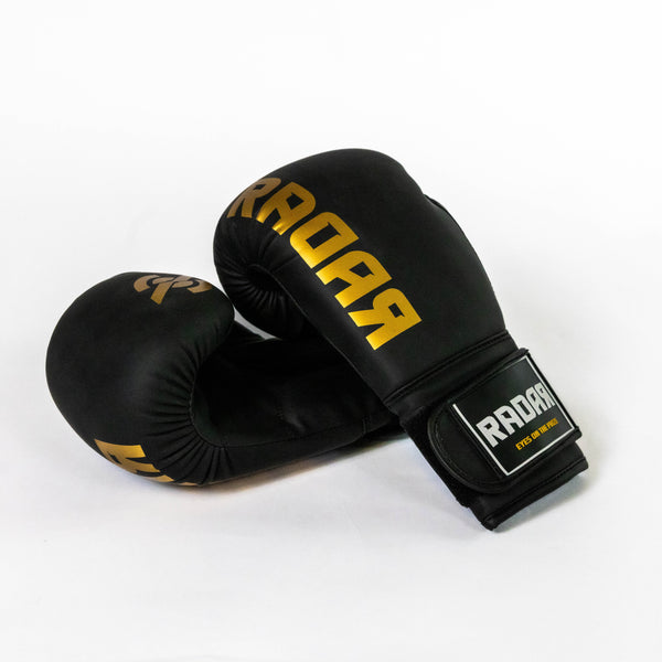 Radar Kids Bokshandschoenen
- Zwart Goud